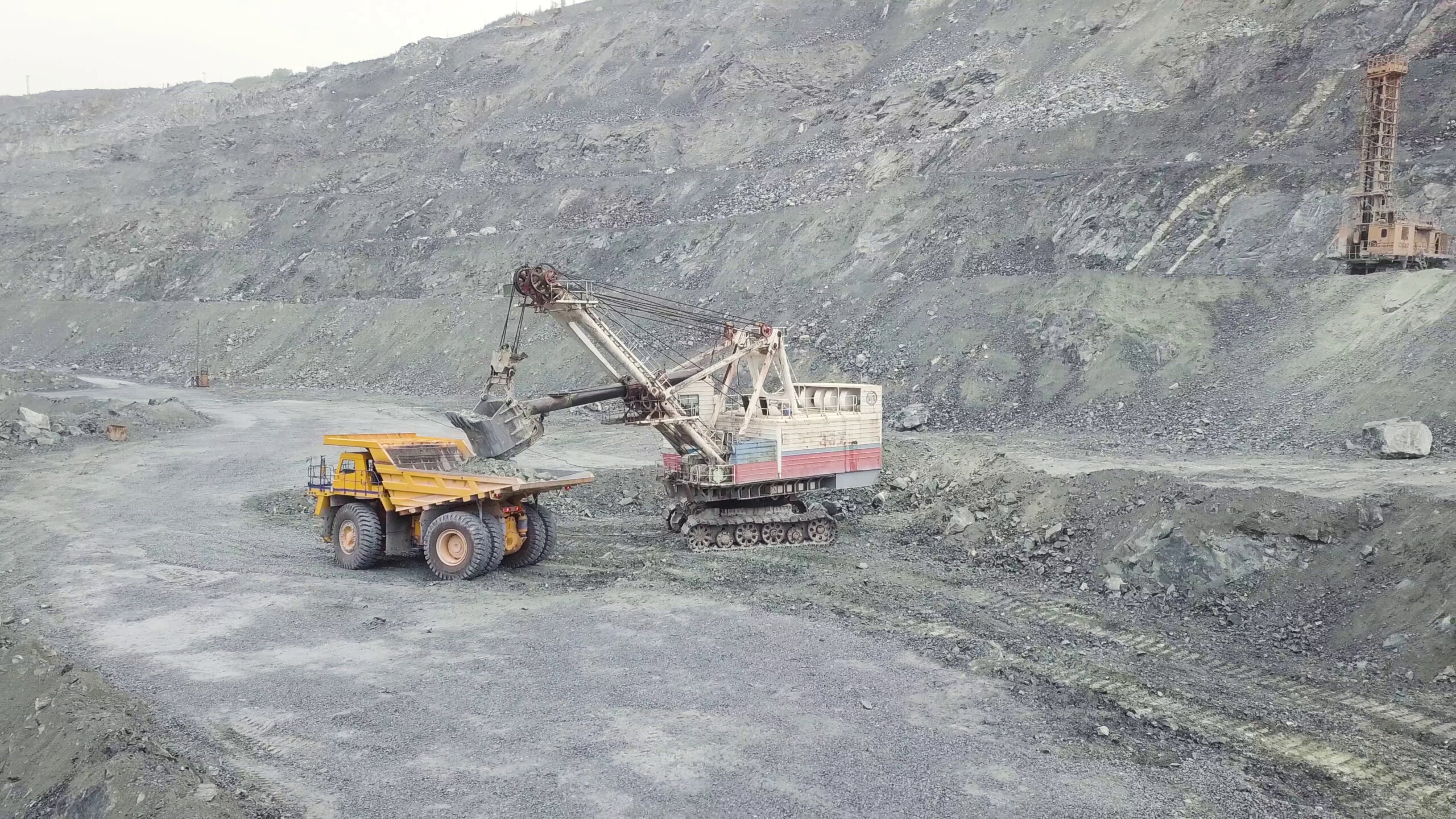excavator-loading-dump-truck excavator loading a dump truck